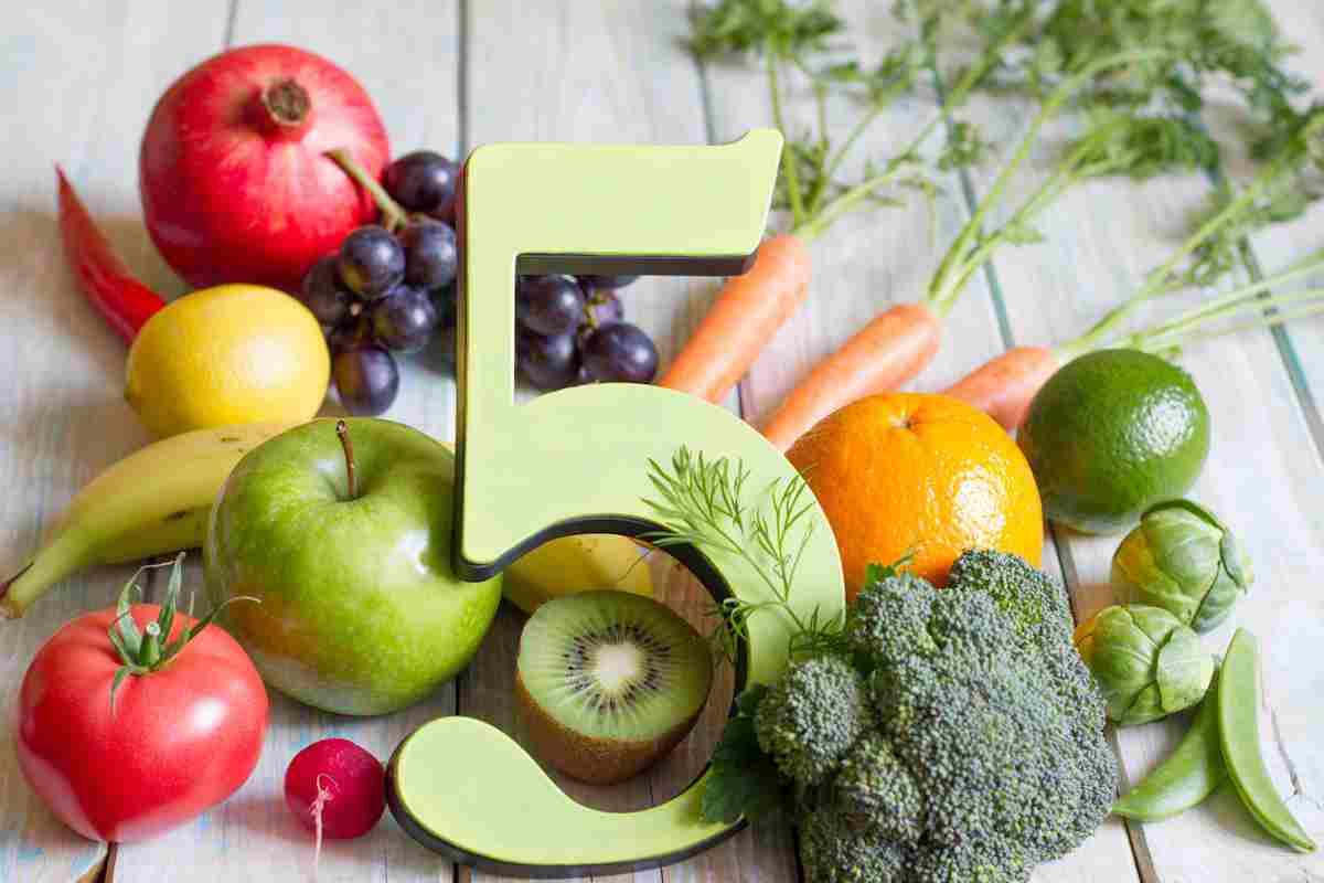 Number 5 surrounded by fruit and vegetables