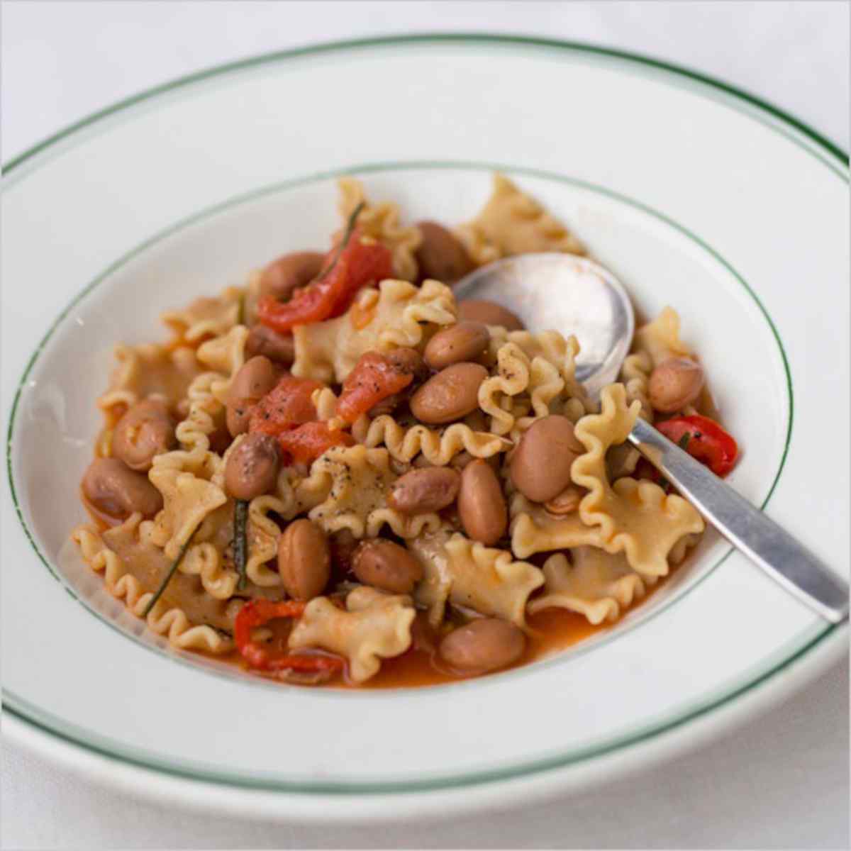 Pasta and borlotti beans in a bowl